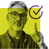 Male Educator giving approval by pointing to checkmark