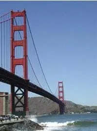 Photo shows cable bridge with two tall supports.