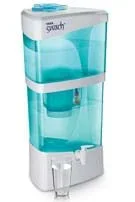 A photograph shows a clear plastic device with a spigot—a tabletop water filter—and a full glass of clear filtered water.