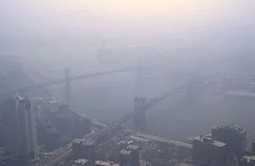 Smog engulfing the city of Manhattan, NY under air pollution.