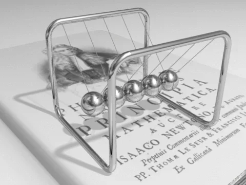 An animation shows a metal frame with five steel balls hanging from it in a line, each touching the balls next to it. As one of the balls is pulled away from the line and let go to be set into motion, it hits the next ball in line and causes a reaction to the subsequent other balls, resulting in the movement of the ball on the opposite end of the line. When this last ball falls back to the ball lineup, the energy is again transferred ball to ball, returning to the first ball. This process repeats and is an illustration of Newton’s third law of motion: for every action there is an equal and opposite reaction.