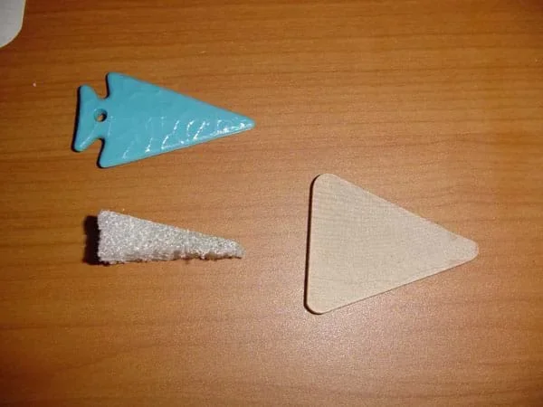 Photograph of three triangular-shaped items.