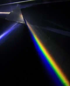 A mercury-vapor lamp with a prism's dispersion of light.