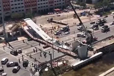 A concrete pedestrian bridge that collapsed before it was complete.