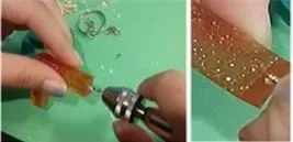 Two pictures showing a hand inserting an eye hook into a resin letter; the second photo is a close-up of the eye hook being inserted into the resin.
