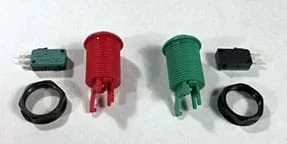 A photograph shows six components lying on a table top. A red arcade button sits next to its removed black plastic nut (ring-shaped) and switch (rectangular-shaped with two prongs). Same for the green arcade button.