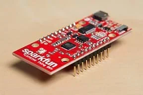 A photograph shows male headers soldered into the Thing board. They are arranged in parallel on the bottom of the Thing board, and placed on either side of the board.
