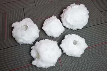 A photograph shows five polyfil-covered paper lanterns of different sizes.