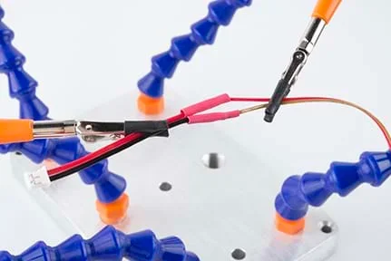 A photograph shows the EL panel cable being held with clamps and short segments of pink-colored heat shrink covering the exposed wires.