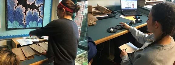 left: a female student reaches with her right hand into a paper bag;
right: a female student pushes down with her right index finger onto a blue foam sample glued to a black yogurt lid.