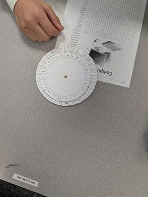 A photo of a student-made decoder wheel.