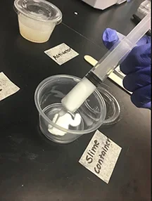 An image showing how to dispense glue into the container.