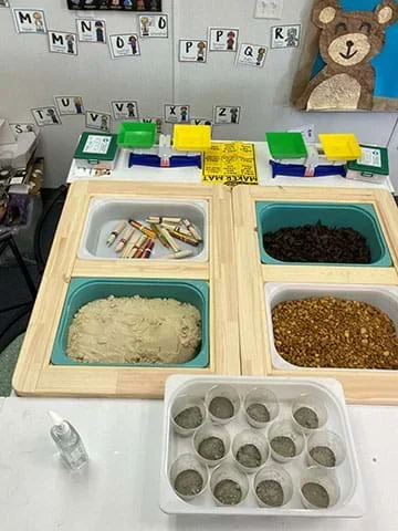 A picture that shows how the materials for the project are organized into bins.
