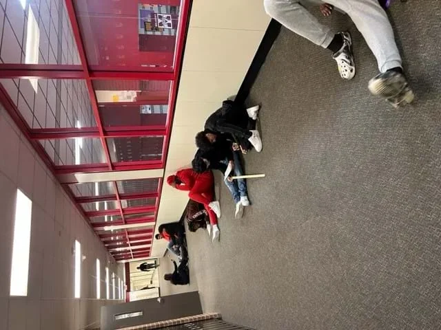Students work on the activity in groups.