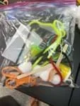 A photo showing bagged supplies for each table group. There were 2-3 groups at each table, and this bag was enough supplies for that.