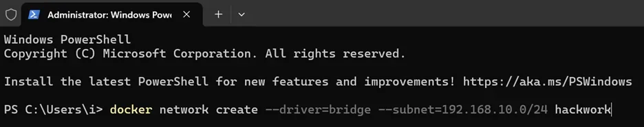 A screenshot of a Windows PowerShell window showing the command docker network create --driver=bridge --subnet=192.168.10.0/24 hackwork being typed. This command is used to create a new Docker network named "hackwork" with a specified IP subnet.