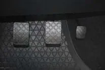 Patterns on pedals in a car.