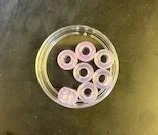 A photo of UV beads under 20 seconds of UV light exposure.