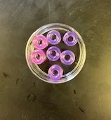 A photo of UV beads under 60 seconds of UV light exposure.